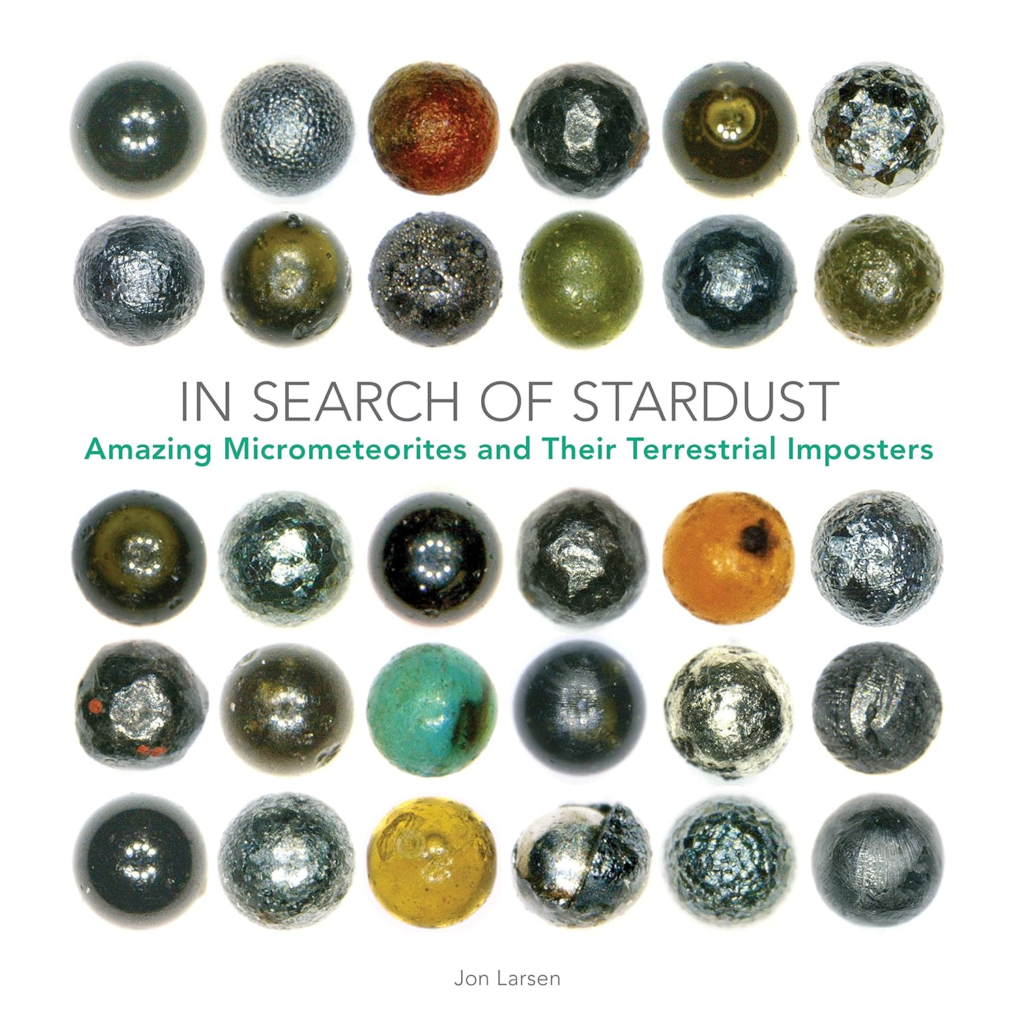 Book cover showing a number of micrometeorites of various colors.